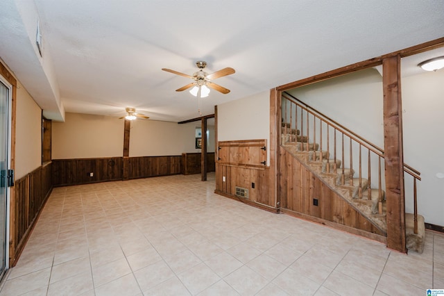 320 Cambo Ln, Hoover, AL 35244 - empty room featuring wainscoting, stairway, a ceiling fan, and wood walls