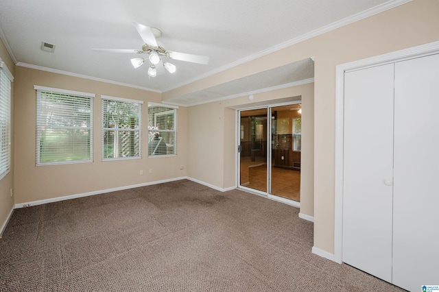 320 Cambo Ln, Hoover, AL 35244 - unfurnished bedroom with ornamental molding, carpet floors, baseboards, multiple windows, and a ceiling fan