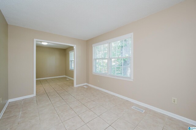 320 Cambo Ln, Hoover, AL 35244 - spare room with light tile patterned flooring and baseboards