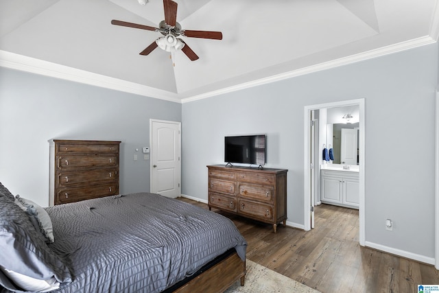 bedroom with high vaulted ceiling, wood finished floors, baseboards, a ceiling fan, and ensuite bath