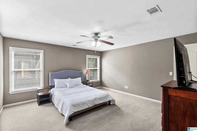 bedroom featuring baseboards, carpet, and ceiling fan