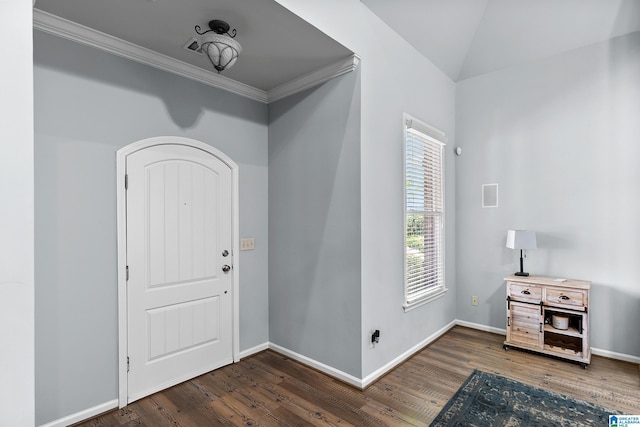 foyer entrance with wood finished floors, baseboards, and ornamental molding