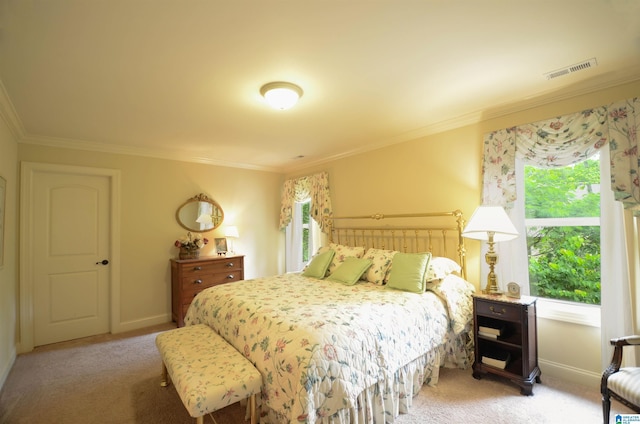 bedroom featuring multiple windows, crown molding, light carpet, and baseboards