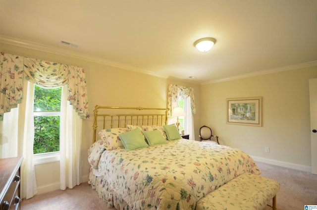 bedroom with light carpet, crown molding, and baseboards