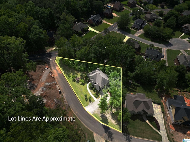 aerial perspective of suburban area with property boundaries highlighted