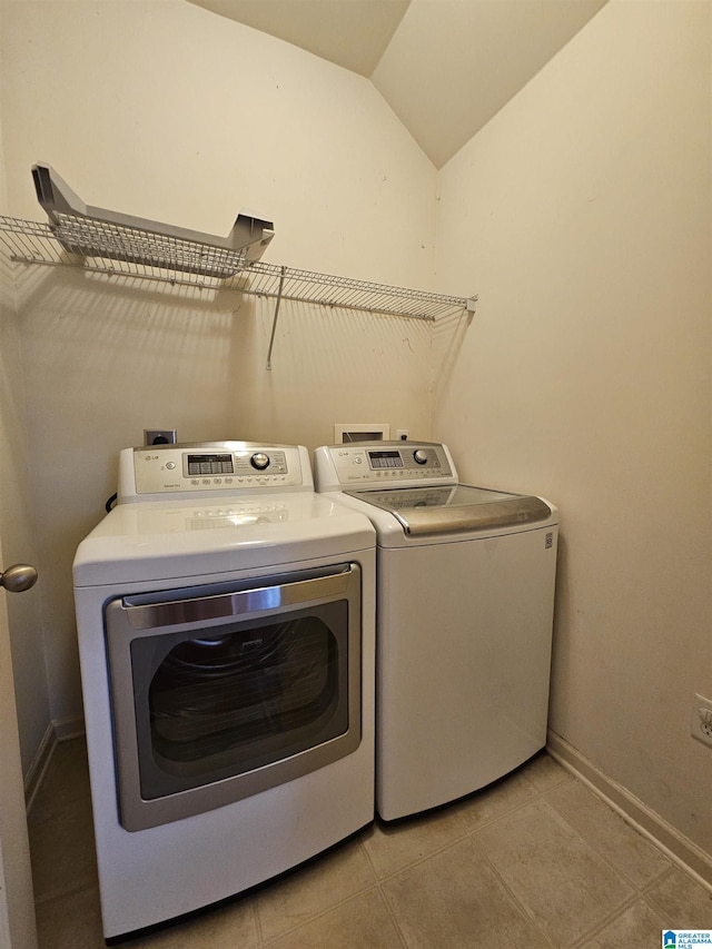 1082 Ivy Pl, Moody, AL 35004 - laundry room with washer and clothes dryer, baseboards, and light tile patterned floors