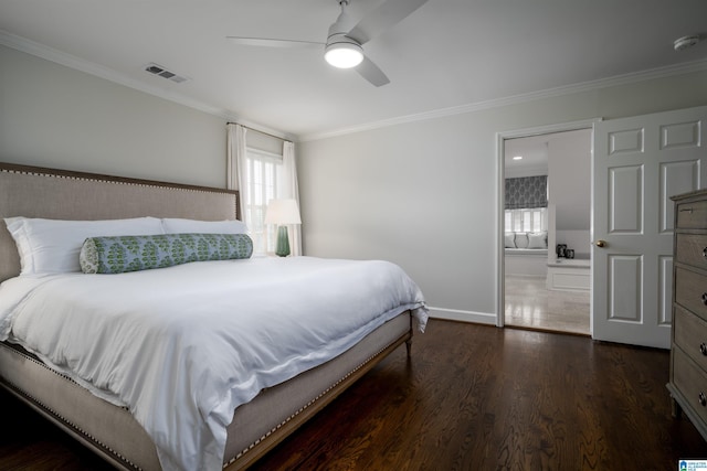 bedroom featuring crown molding, dark wood-type flooring, baseboards, a ceiling fan, and ensuite bathroom