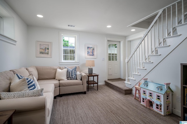 living area featuring carpet flooring, stairway, recessed lighting, and baseboards
