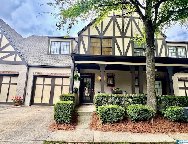 2232 Acton Park Cir, Birmingham, AL 35243 - view of front of property featuring concrete driveway, stucco siding, roof with shingles, and covered porch