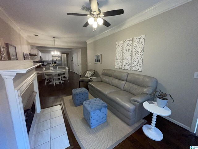 2232 Acton Park Cir, Birmingham, AL 35243 - living area featuring ornamental molding, a ceiling fan, light wood finished floors, and baseboards
