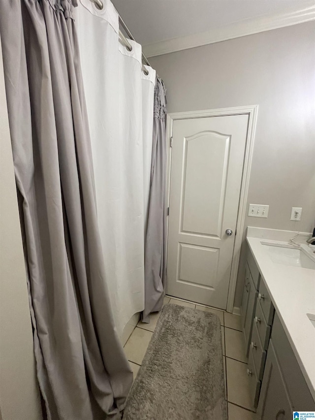 2232 Acton Park Cir, Birmingham, AL 35243 - full bathroom with ornamental molding, tile patterned flooring, vanity, and curtained shower
