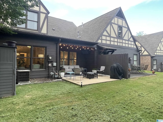 2232 Acton Park Cir, Birmingham, AL 35243 - rear view of property featuring a shingled roof, a patio area, cooling unit, a yard, and an outdoor living space