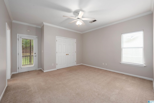 1656 Deer Valley Rd, Hoover, AL 35226 - unfurnished bedroom with light colored carpet, crown molding, baseboards, a ceiling fan, and access to exterior