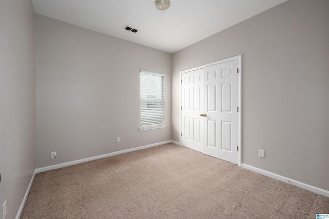 1656 Deer Valley Rd, Hoover, AL 35226 - unfurnished bedroom with carpet flooring, baseboards, and a closet