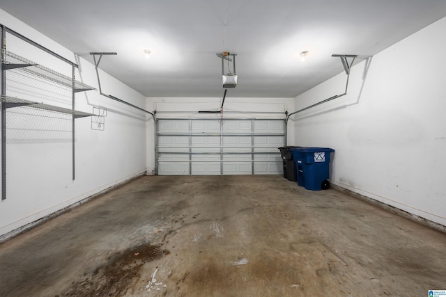 1656 Deer Valley Rd, Hoover, AL 35226 - garage with a garage door opener and baseboards