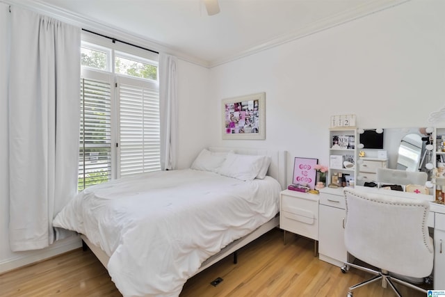 4017 Milner Way, Birmingham, AL 35242 - bedroom with ornamental molding, light wood-style floors, and a ceiling fan