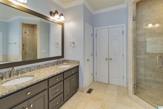 4017 Milner Way, Birmingham, AL 35242 - full bathroom with a shower stall, double vanity, ornamental molding, a closet, and tile patterned floors