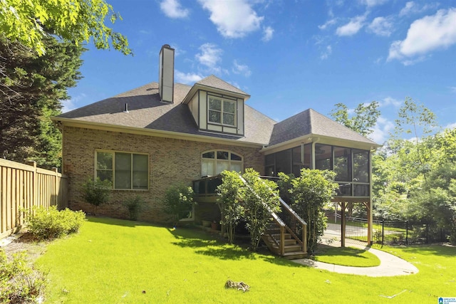 4017 Milner Way, Birmingham, AL 35242 - rear view of house with a sunroom, a chimney, brick siding, and roof with shingles