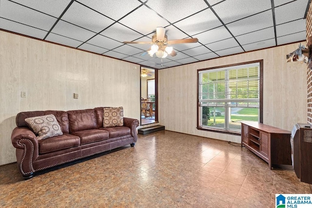 5241 County Road 48, Jemison, AL 35085 - living room with ceiling fan, wood walls, and a paneled ceiling