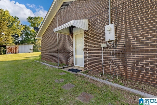 5241 County Road 48, Jemison, AL 35085 - property entrance featuring a lawn and brick siding