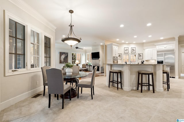 4035 Saint Charles Dr, Hoover, AL 35242 - dining area featuring crown molding, recessed lighting, baseboards, and light tile patterned flooring