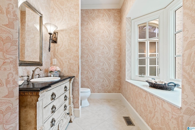 4035 Saint Charles Dr, Hoover, AL 35242 - half bath with wallpapered walls, toilet, vanity, tile patterned flooring, and healthy amount of natural light