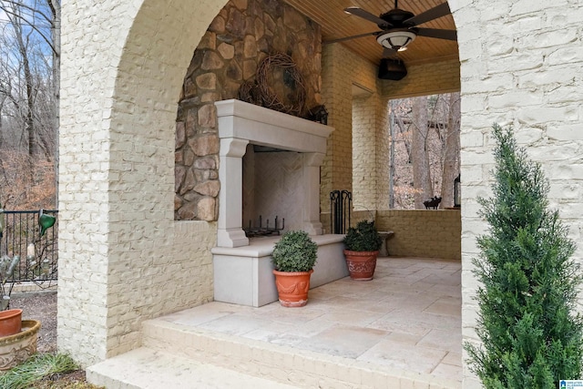 4035 Saint Charles Dr, Hoover, AL 35242 - view of patio with an outdoor stone fireplace, a ceiling fan, and fence