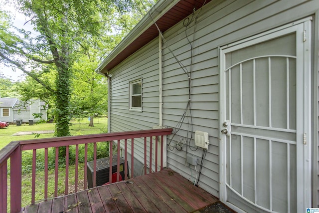 deck featuring central air condition unit