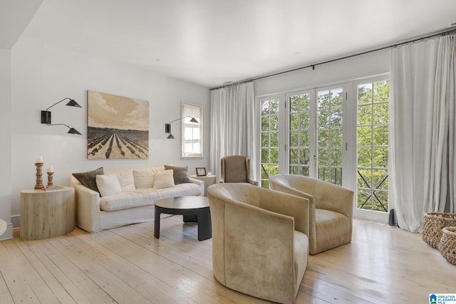 sitting room featuring light wood finished floors