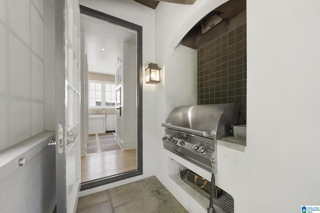 exterior space with stone finish flooring