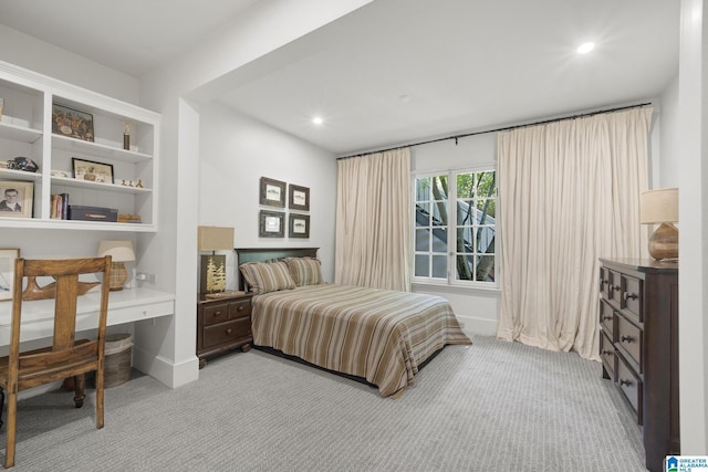 bedroom with light carpet, an office area, recessed lighting, and baseboards