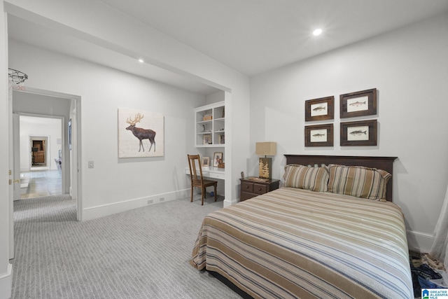 carpeted bedroom with baseboards and recessed lighting