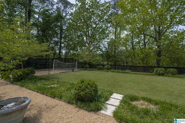 view of yard featuring fence and an area for soccer