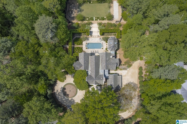 aerial view of property's location with a pool