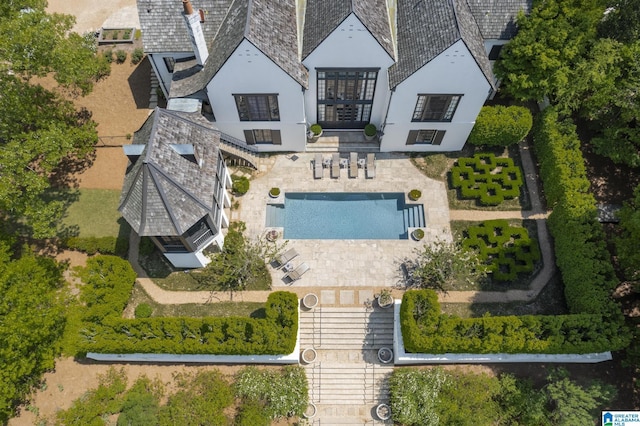 view from above of property featuring a pool