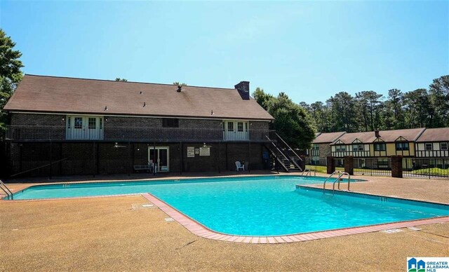3657 Haven View Cir Unit 3657, Hoover, AL 35216 - community pool with stairway, fence, a patio area, and french doors