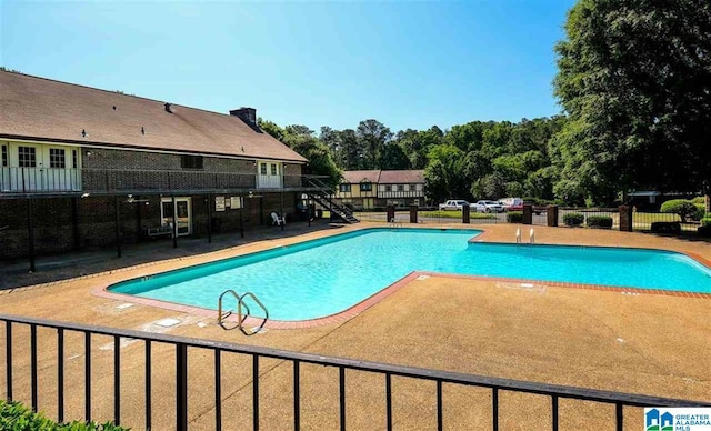 3657 Haven View Cir Unit 3657, Hoover, AL 35216 - community pool featuring a patio area, fence, and stairway