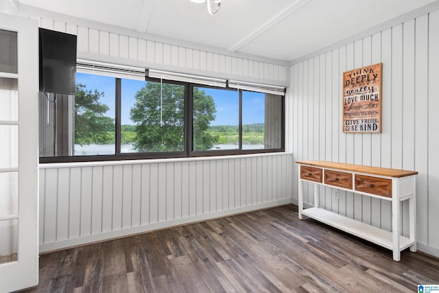 empty room featuring wood finished floors