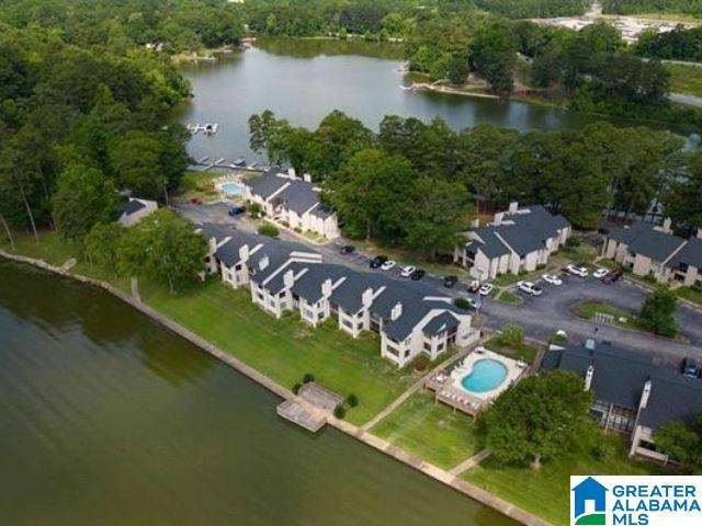 aerial view of a large body of water and a pool area
