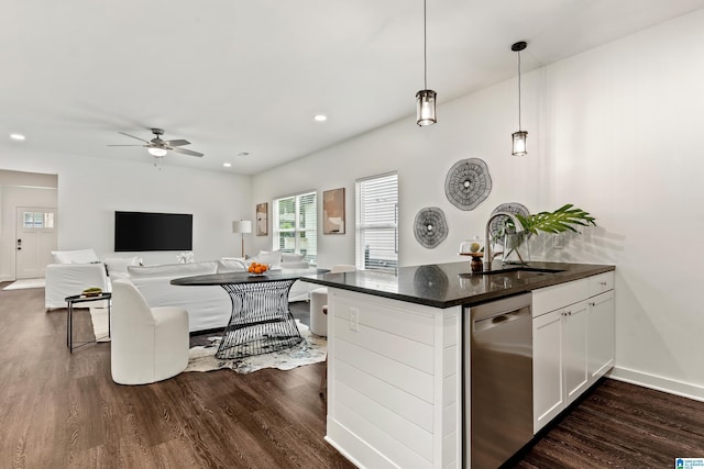 2213 3rd Ave S, Irondale, AL 35210 - kitchen featuring stainless steel dishwasher, a sink, dark wood finished floors, white cabinets, and recessed lighting