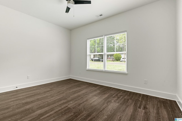2213 3rd Ave S, Irondale, AL 35210 - empty room with dark wood finished floors, baseboards, and ceiling fan
