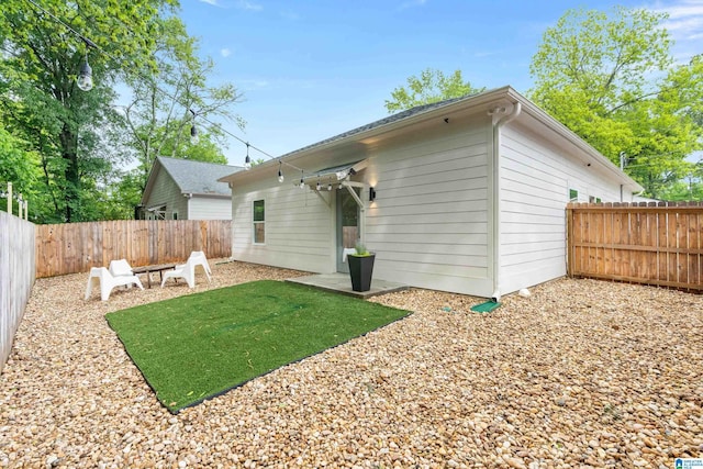2213 3rd Ave S, Irondale, AL 35210 - rear view of property with a fenced backyard