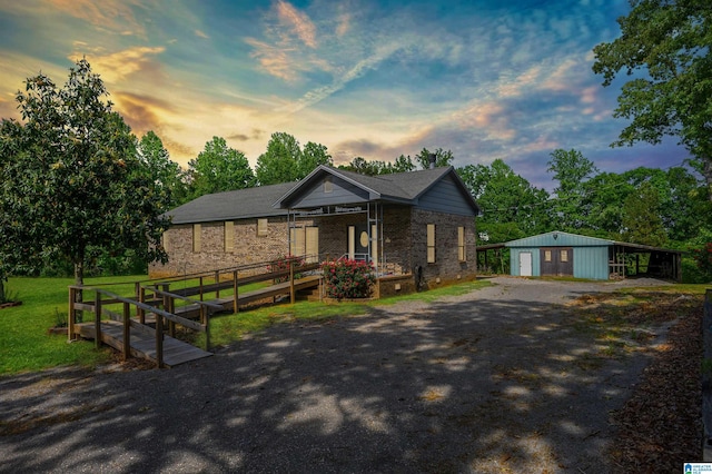1492 Paul Allman Rd, Adger, AL 35006 - view of front of house with an outbuilding, a garage, view of wooded area, and driveway