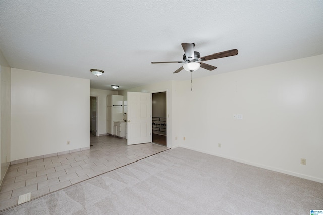 1492 Paul Allman Rd, Adger, AL 35006 - carpeted empty room with a ceiling fan, baseboards, and tile patterned flooring