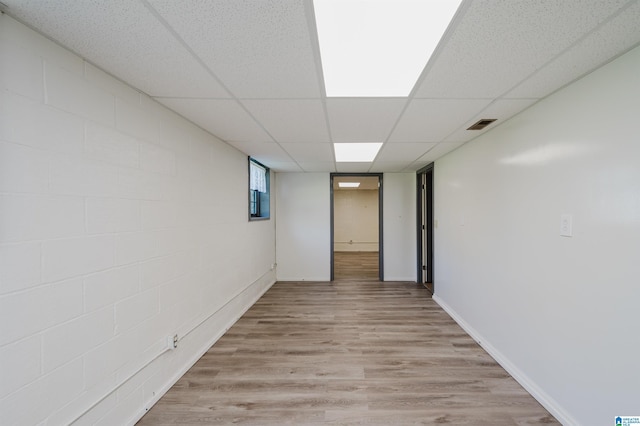 1492 Paul Allman Rd, Adger, AL 35006 - basement with light wood-type flooring, a drop ceiling, and baseboards