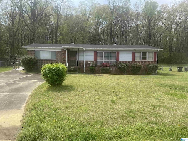 939 Brandy Ln, Birmingham, AL 35214 - ranch-style house featuring brick siding, a front lawn, and concrete driveway