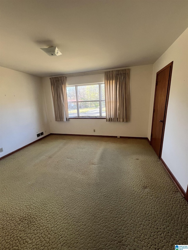 939 Brandy Ln, Birmingham, AL 35214 - carpeted empty room with baseboards