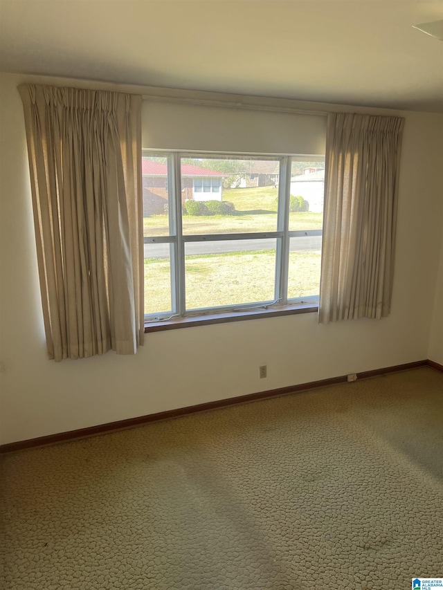 939 Brandy Ln, Birmingham, AL 35214 - carpeted spare room featuring plenty of natural light and baseboards