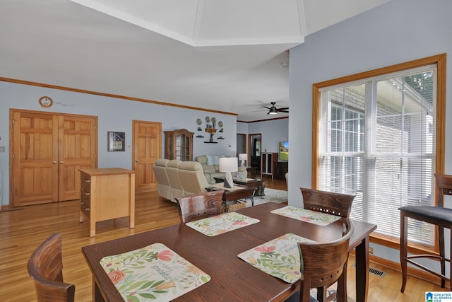 154 Baron Dr, Chelsea, AL 35043 - dining area with healthy amount of natural light, light wood-style flooring, a ceiling fan, and ornamental molding