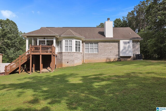 154 Baron Dr, Chelsea, AL 35043 - rear view of house featuring a sunroom, stairs, central AC, and brick siding